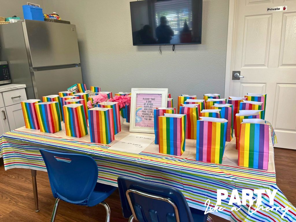 The rainbow bags were filled with school supplies for the teachers to take!